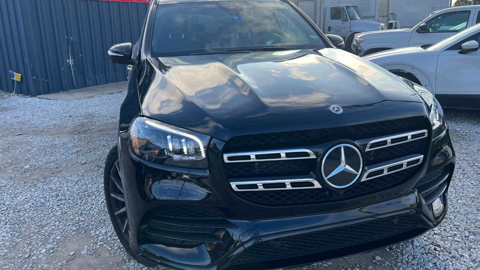 Expert collision repair on a white SUV after a side impact accident in the DFW metroplex.